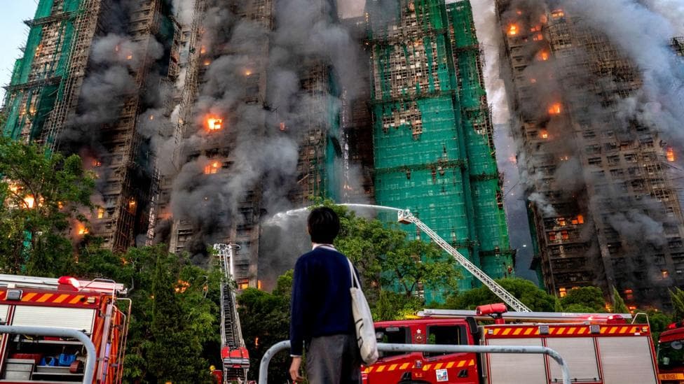 'Hang in there': Agonising wait for the missing after Hong Kong blaze