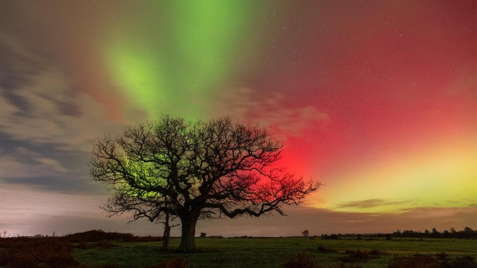 Northern Lights illuminate UK skies in hues of pink and green