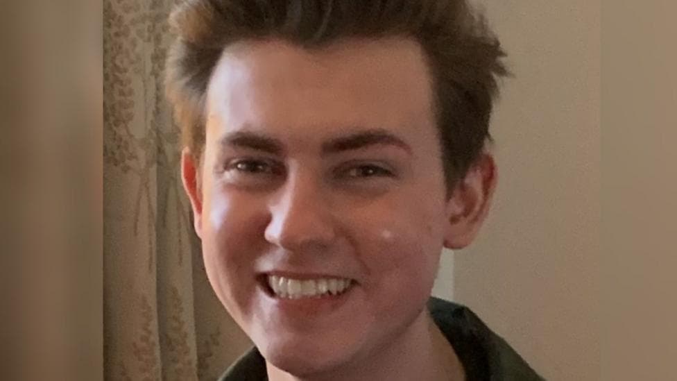 Mother collects degree for student who took his life after marking error