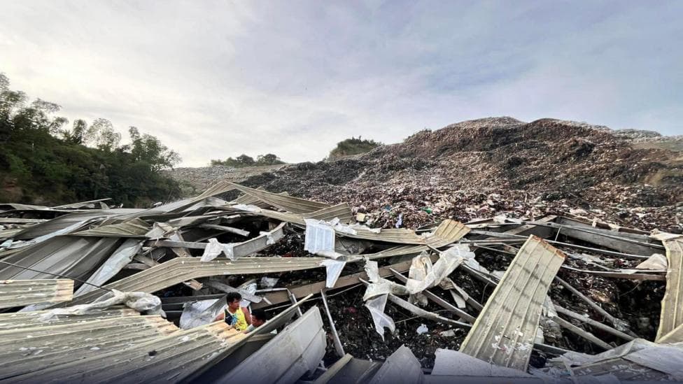 One dead, dozens trapped after giant landfill collapses in Philippines