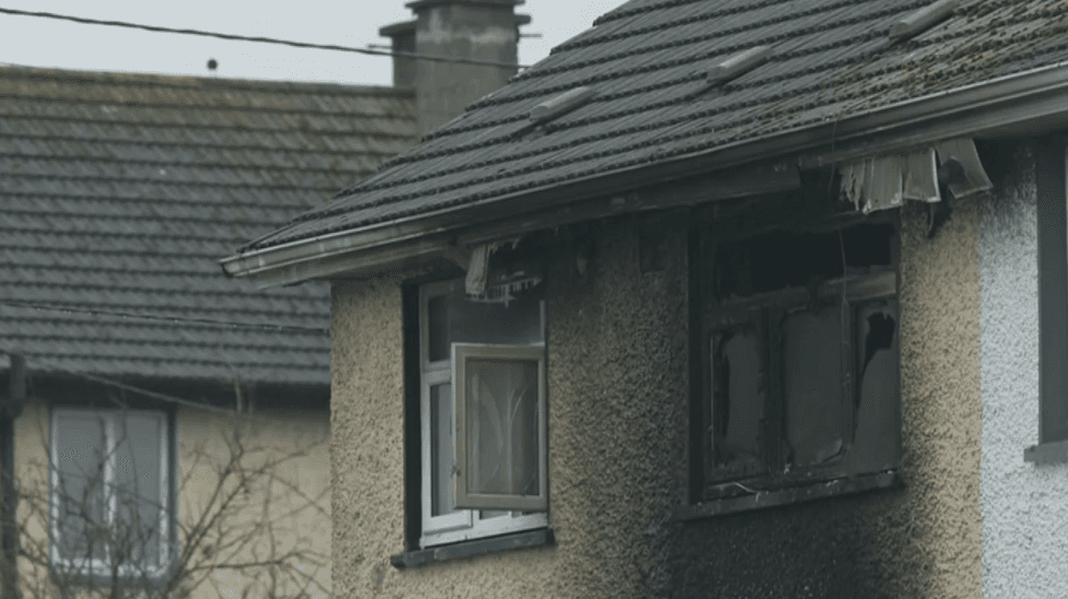 Murder investigation after child and woman die in house fire