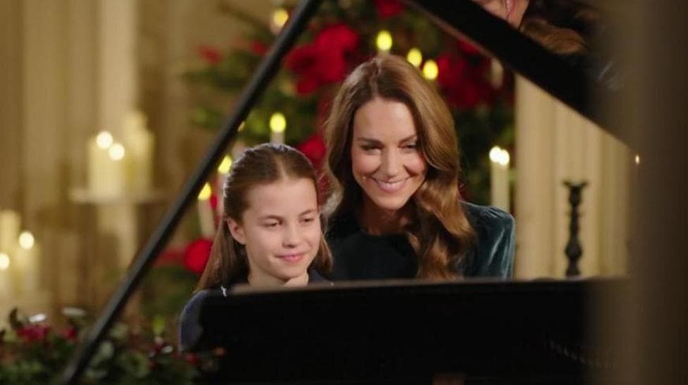 Catherine and Charlotte perform piano duet for Christmas carol concert