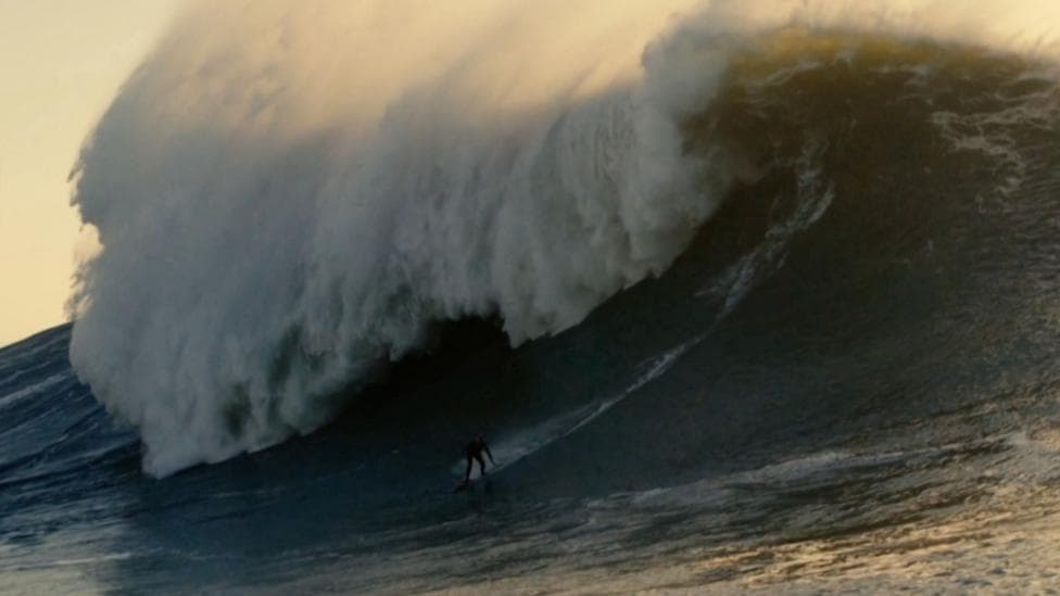 Watch: British woman surfs potentially record-breaking monster wave
