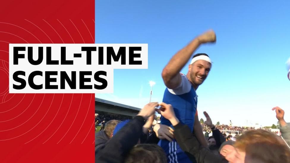 Macclesfield fans invade the pitch after beating Palace