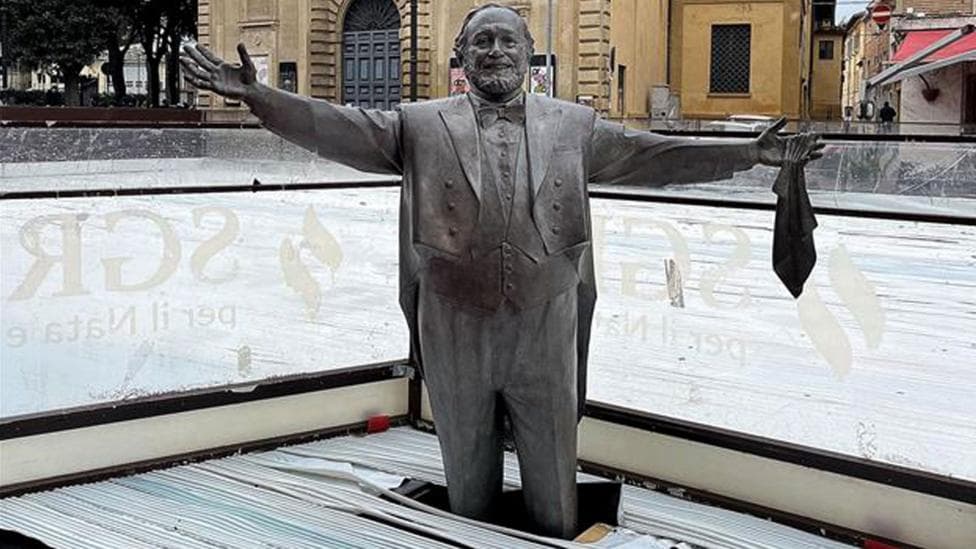 Pavarotti statue frozen knee-deep in ice rink strikes wrong note in Italy