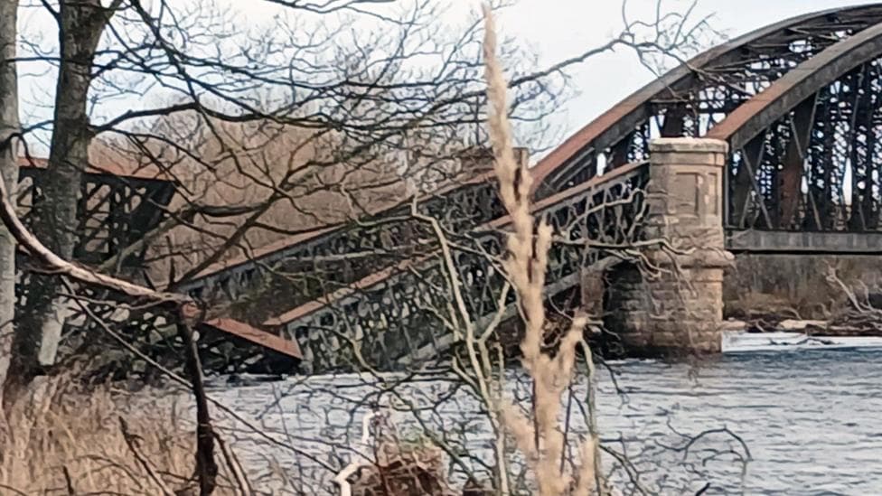 Historic rail bridge collapses into River Spey