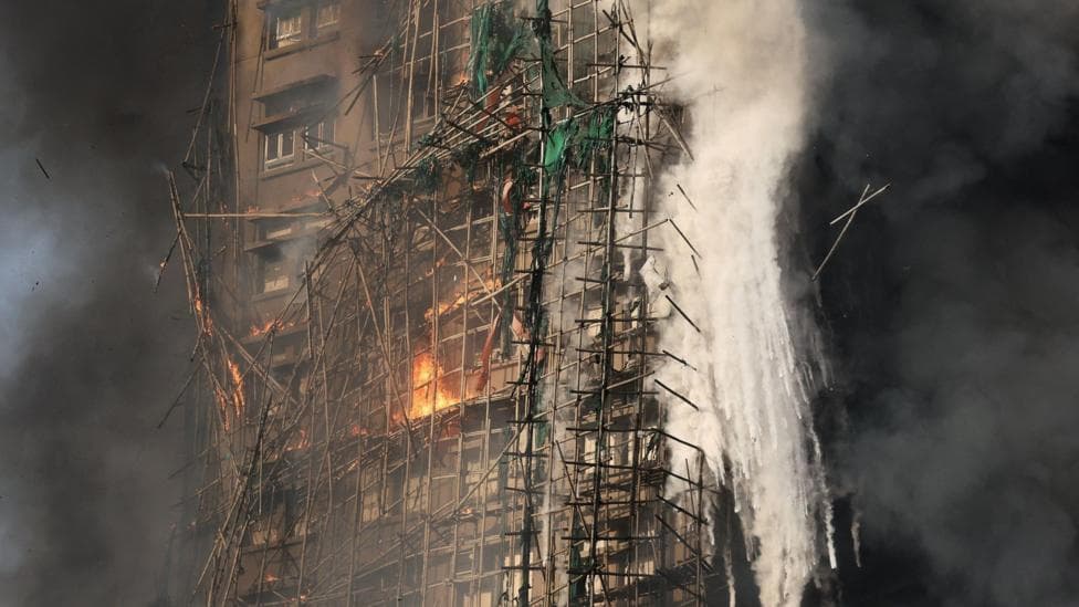 Firefighters search for hundreds still missing in devastating Hong Kong tower blocks fire