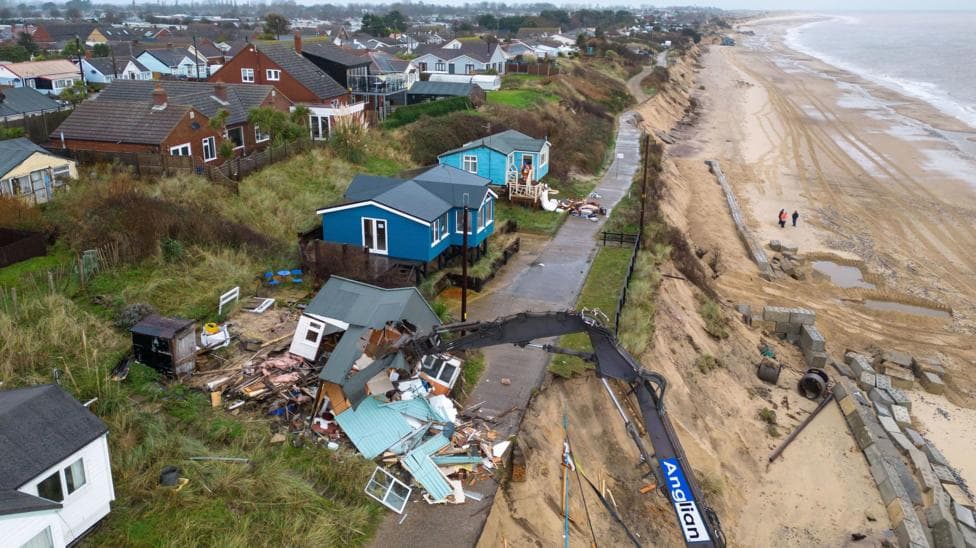 Fourteen clifftop homes face 'imminent' collapse